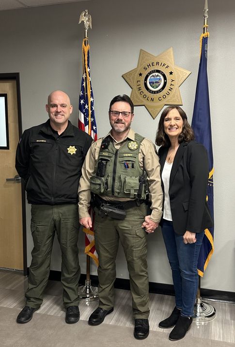 Sheriff Shanks, Deputy Ross, andRuth Ross.